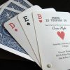 A unique, custom casino night themed 30th birthday party invitation that resembles playing cards.