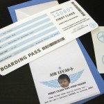 A unique custom airplane themed 1st birthday party invitation that looks like airline tickets.