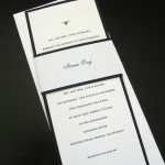 A modern, black and white custom wedding invitation set.