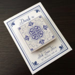 A custom Dutch inspired 75th birthday party favor, Dutch style tile magnet.