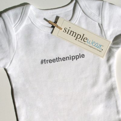 A simplewear baby bodysuit to promote breastfeeding in public using the hashtag, #freethenipple.