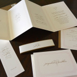 A modern, traditional custom 4 panel accordion fold wedding invitation set with reply card, thank you card and bookmark.