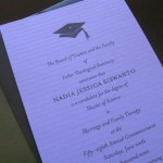 A custom purple and black graduation announcement for a Master’s graduate.