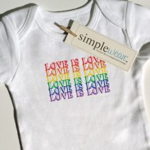 A simplewear baby bodysuit to promote gay pride using the phrase, Love is Love.